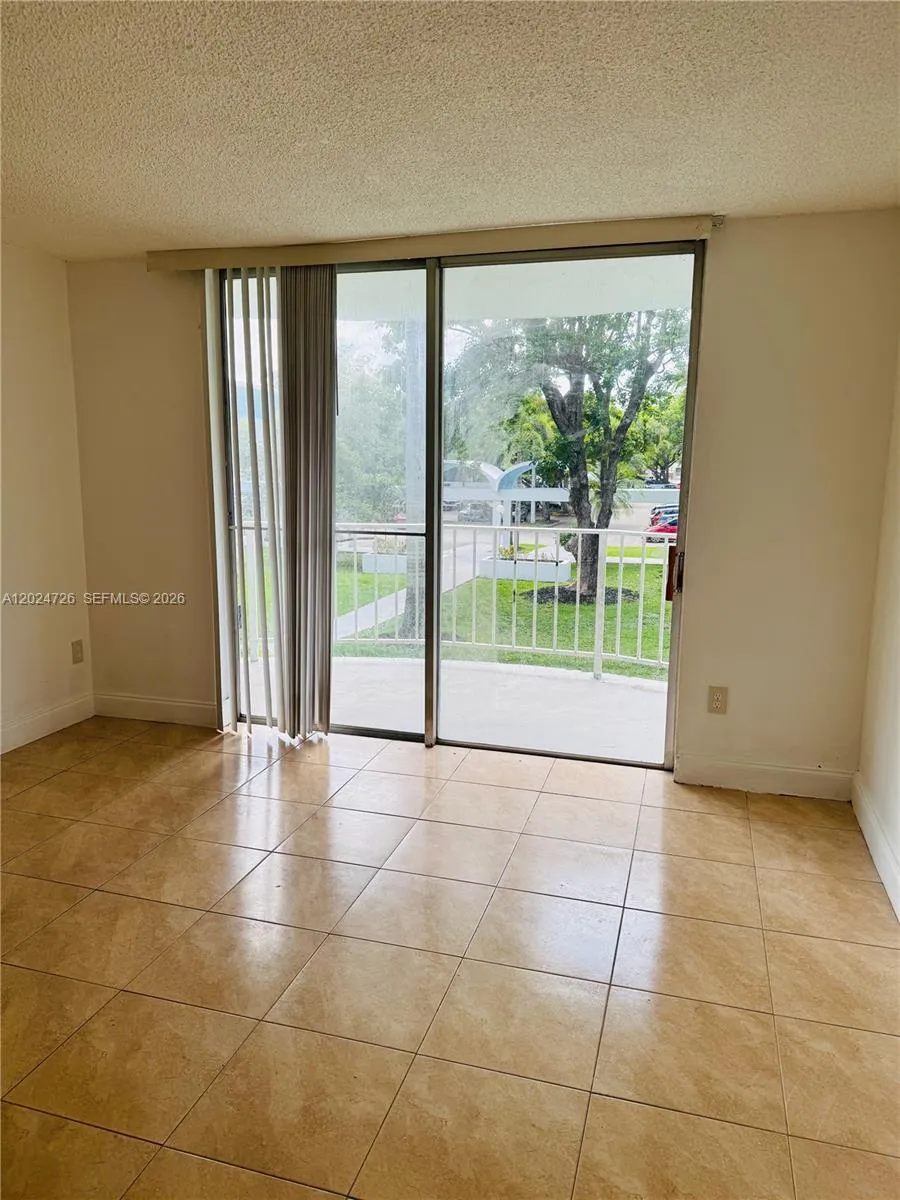 486 NW 165th St Rd # 201, Miami FL 33169
