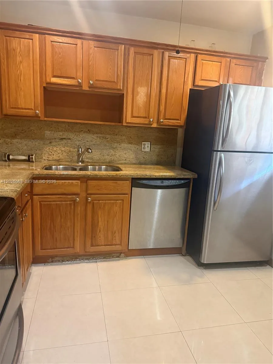100 Ashbury Rd # 104, Hollywood FL 33024
