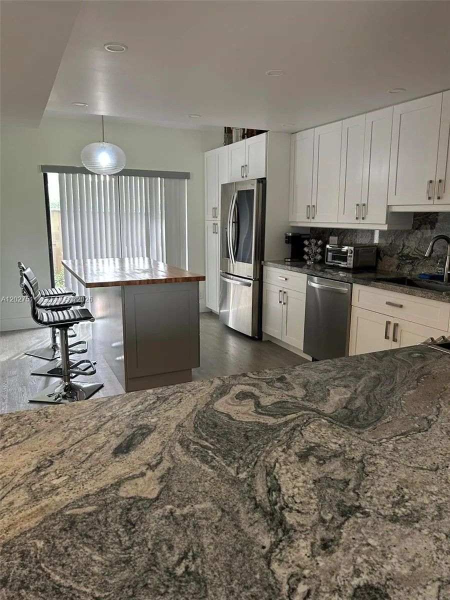 2345 Deer Creek Woodlands Way, Deerfield Beach FL 33442