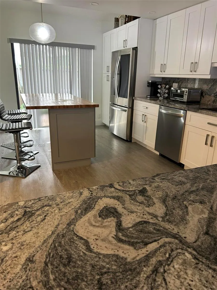 2345 Deer Creek Woodlands Way, Deerfield Beach FL 33442