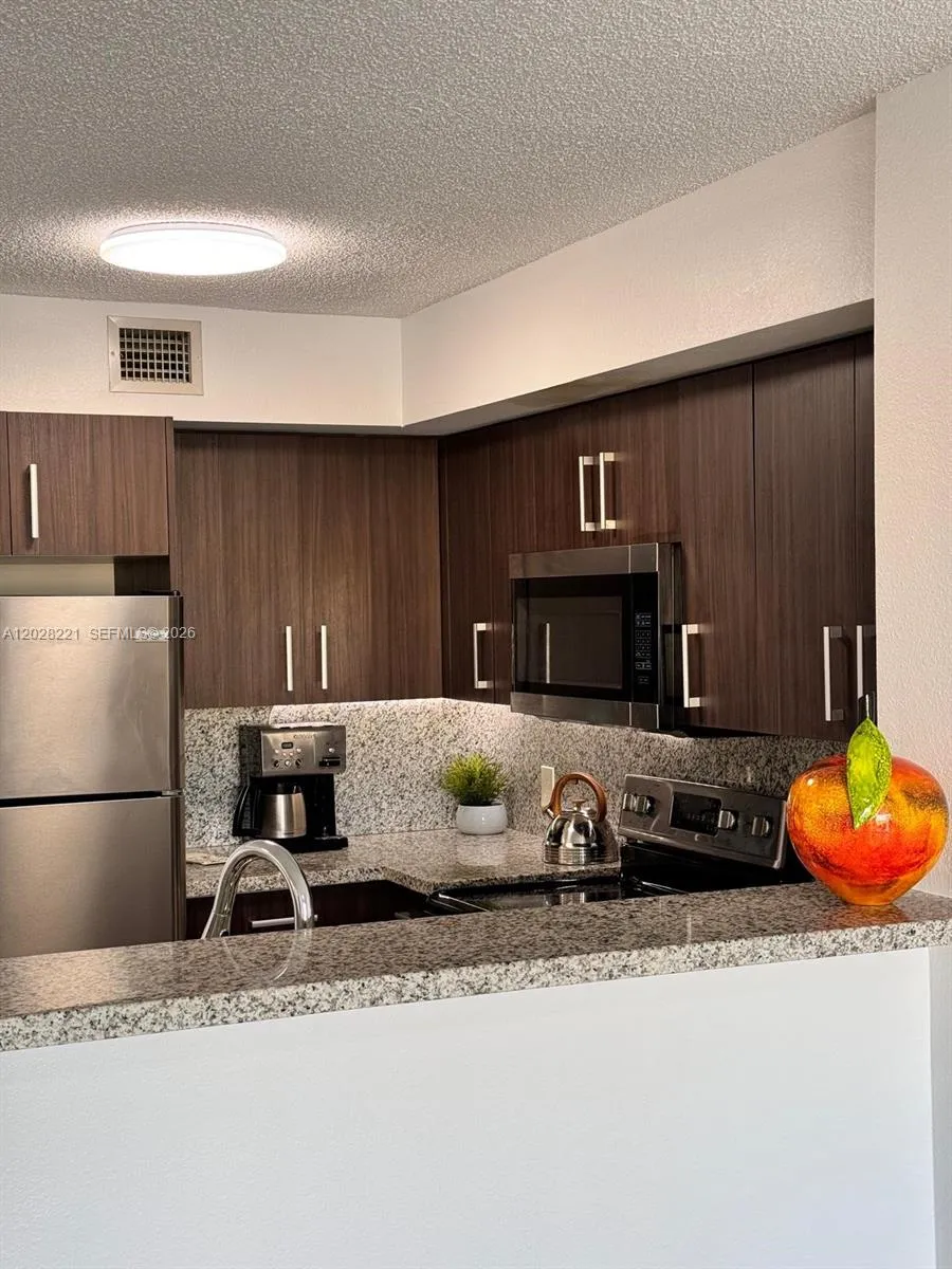 4420 NW 107th Ave # 206, Doral FL 33178