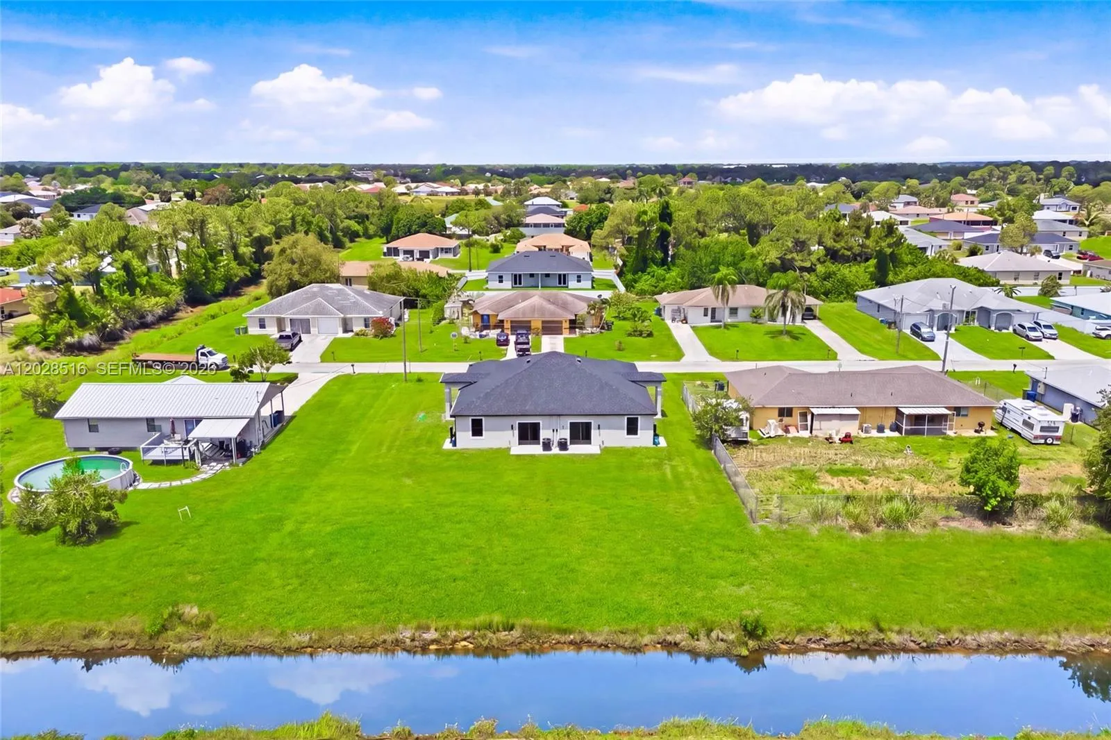 225/227 Hightower AVE S, Lehigh Acres FL 33973