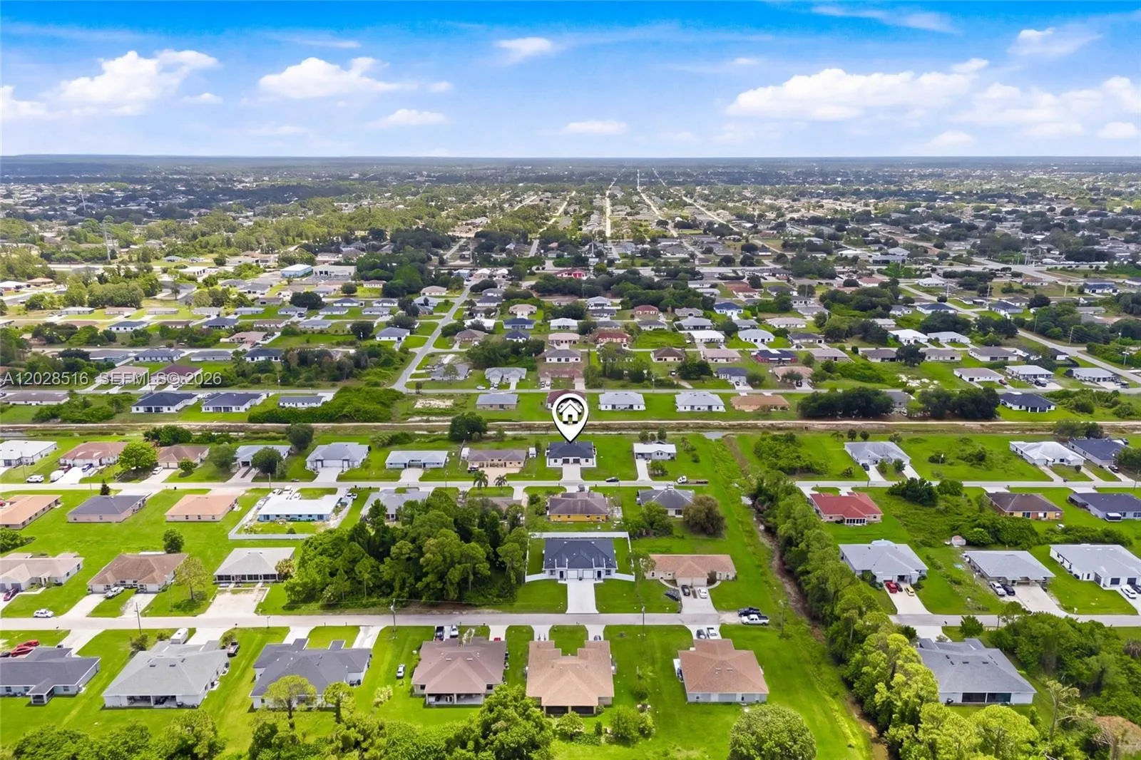 225/227 Hightower AVE S, Lehigh Acres FL 33973