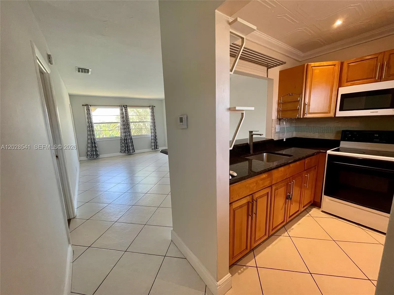5021 W Oakland Park Blvd # 309, Lauderdale Lakes FL 33313