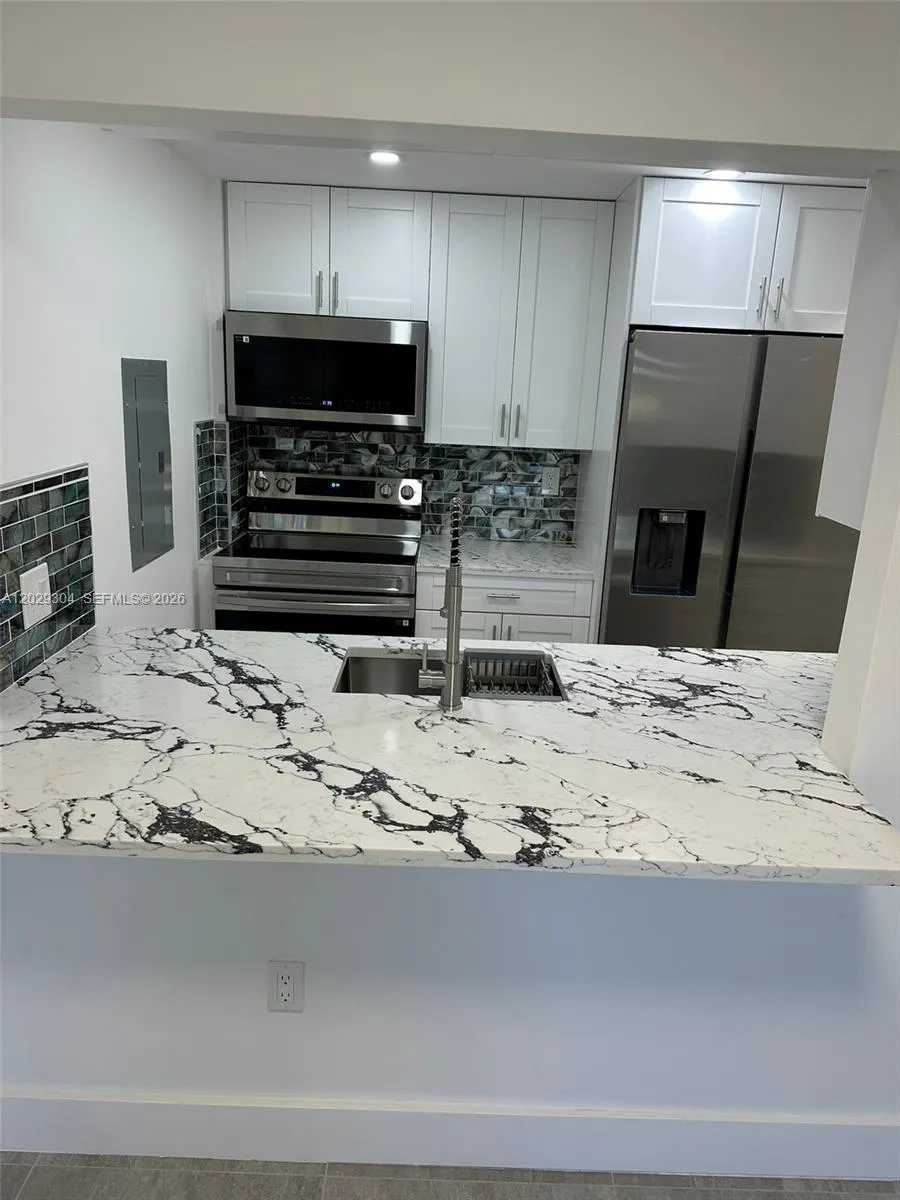 5280 NW 7th St # 306, Miami FL 33126