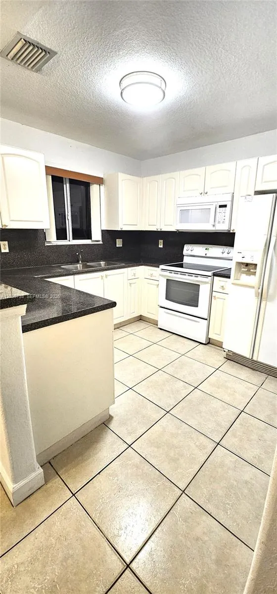 7309 NW 173rd Dr # 104, Miami FL 33015